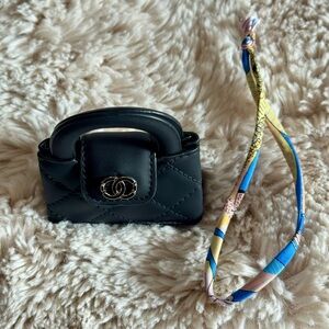 Elegant Black Mini Bag with Detailed stitches and removable little accessory